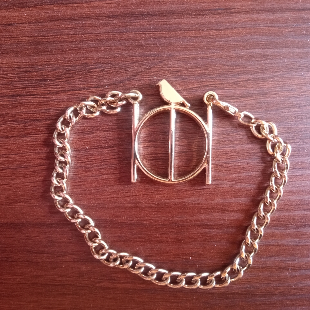 Gold Chain Bracelet with Bird Charm